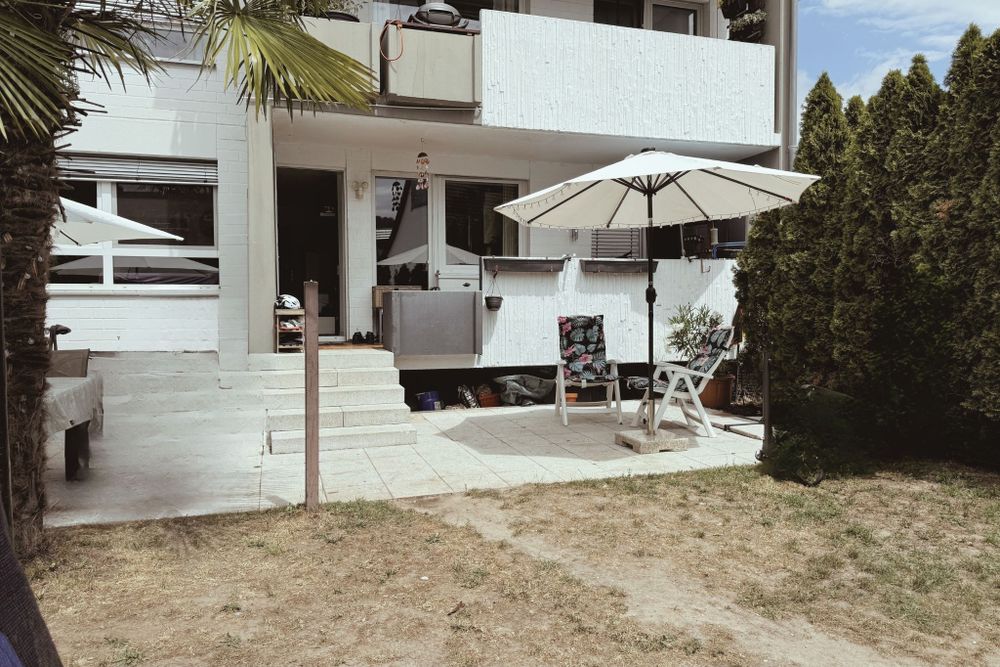4-Zimmer-EG-Wohnung mit Garten im 3-Parteienhaus, Garage & Stellplatz – Bild 1
